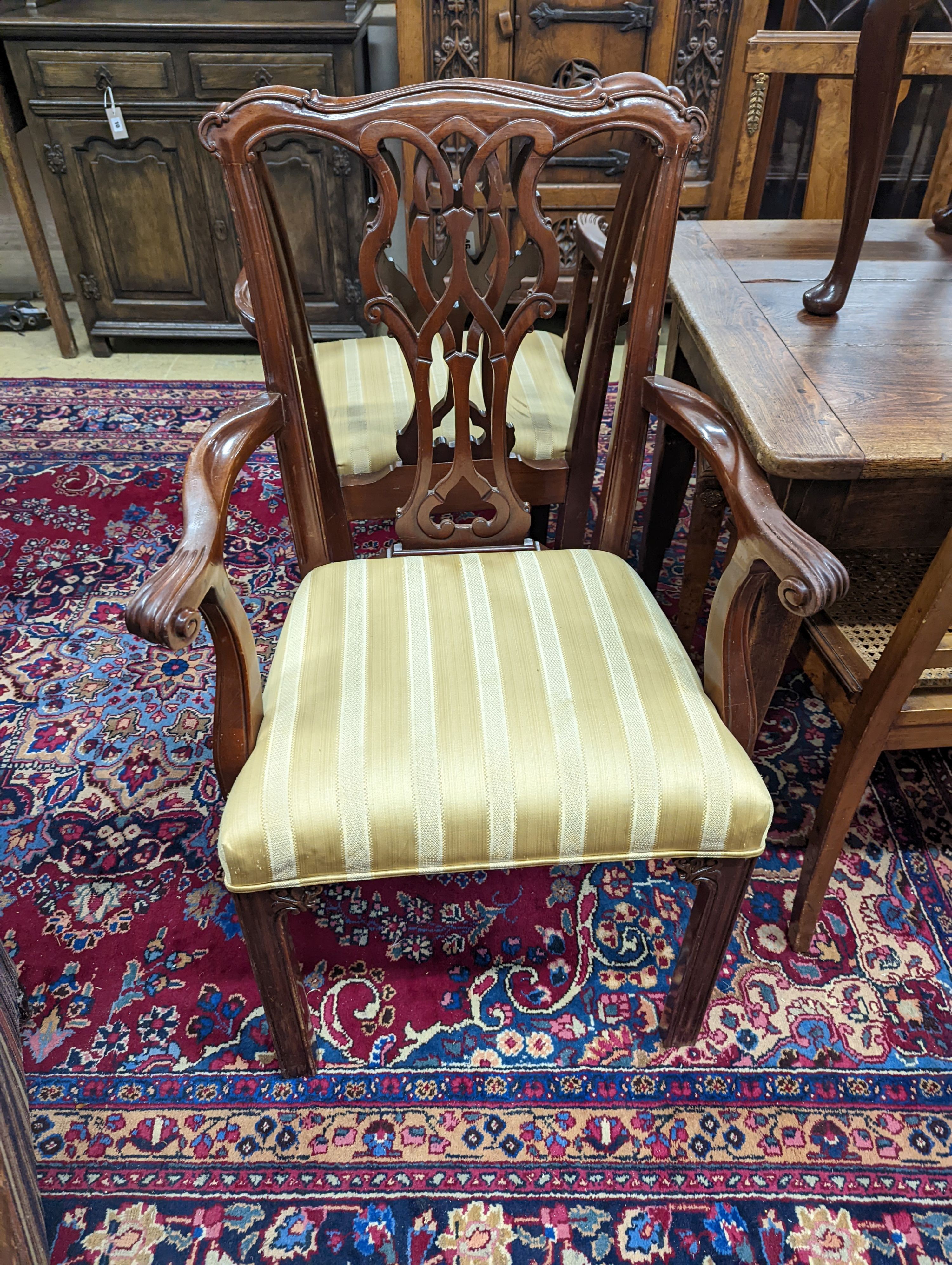 A pair of Chippendale style mahogany carver chairs. H-99cm.